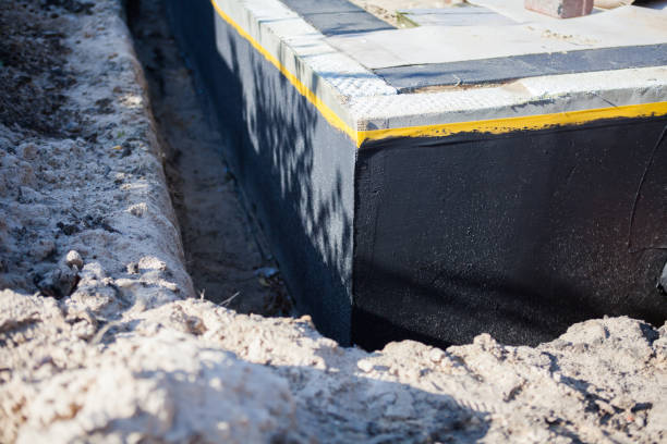 Professional Waterproofing technician working in Maywood, NJ